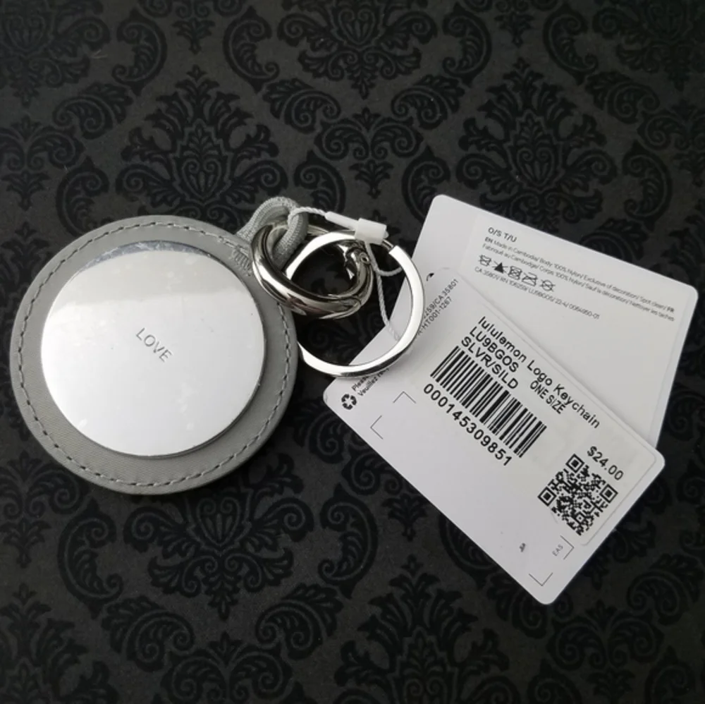 NWT Lululemon Unisex Logo Bag Charm & Keychain Silver/Silver Drop